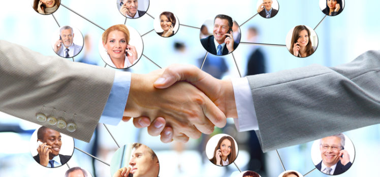 business handshake team background